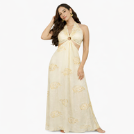 Woman wearing a beige floral dress on a white background