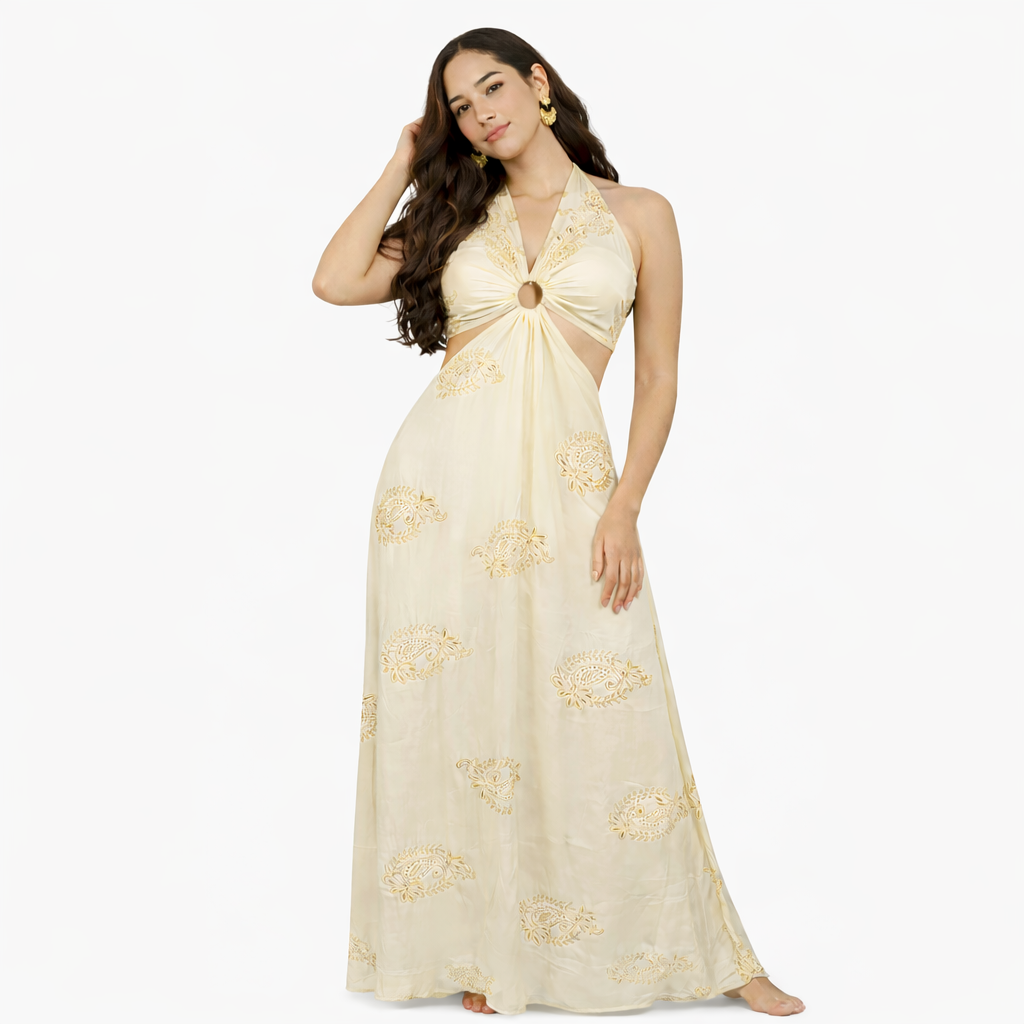 Woman wearing a beige floral dress on a white background
