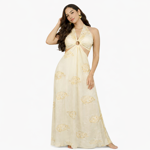 Woman wearing a beige floral dress on a white background