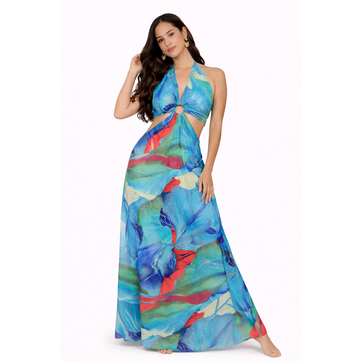 Woman wearing a colorful floral dress on a white background