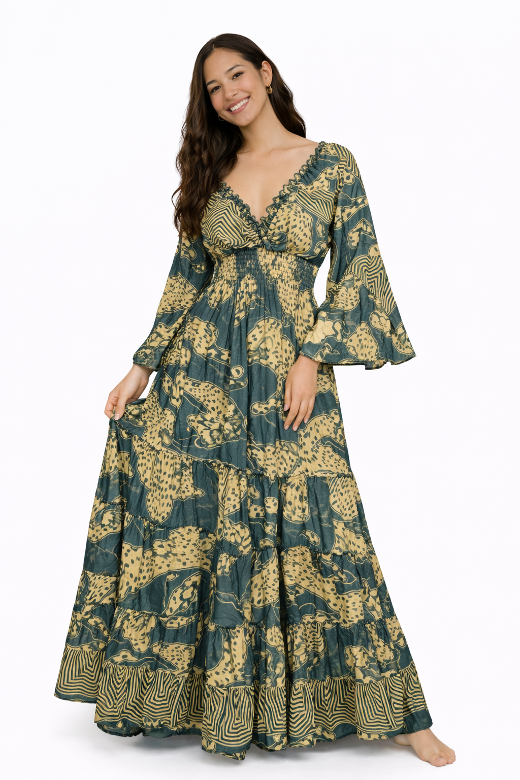 Woman wearing a long floral dress on a white background