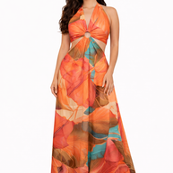 Woman wearing an orange floral dress on a white background